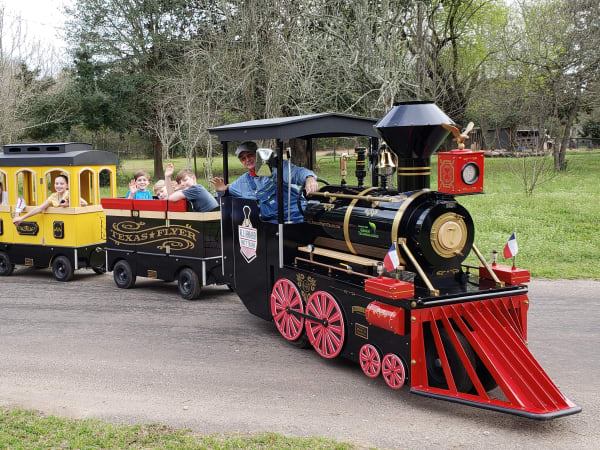 The Texas Flyer trackless train at an outdoor event