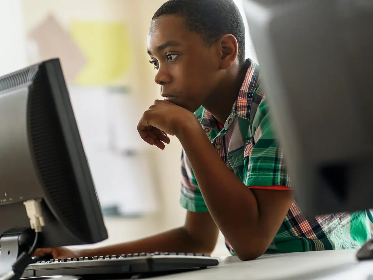 Student using a laptop during Homework Lab
