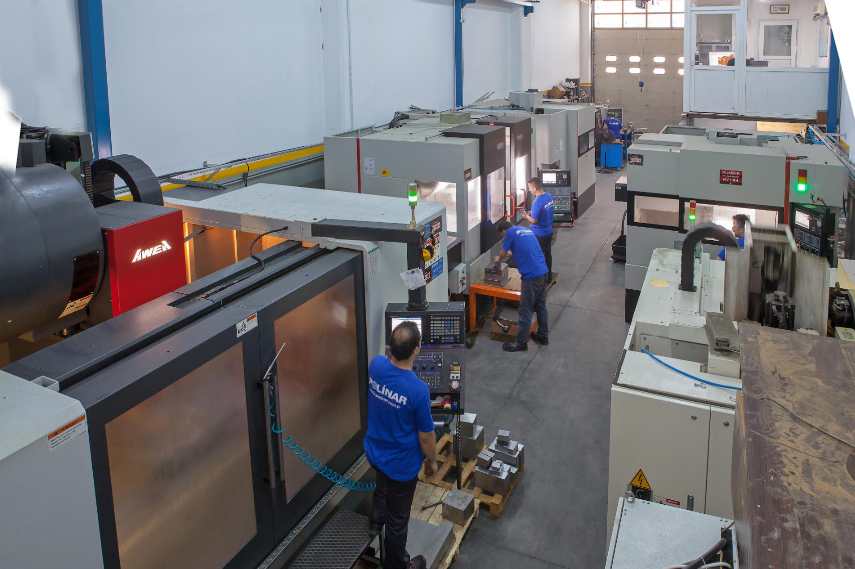 CNC machining workshop with Polinar technicians