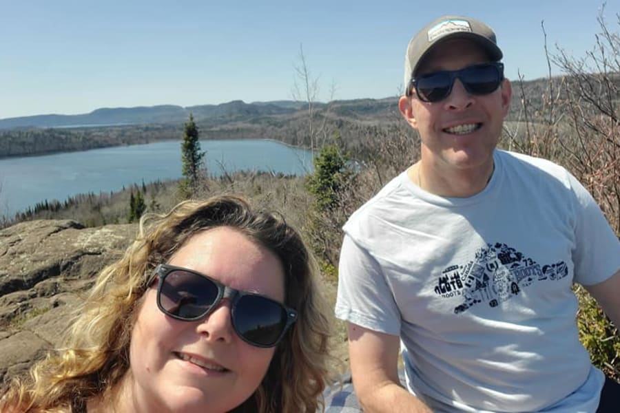 Selfie of Michelle & her husband at the top of Finger Point