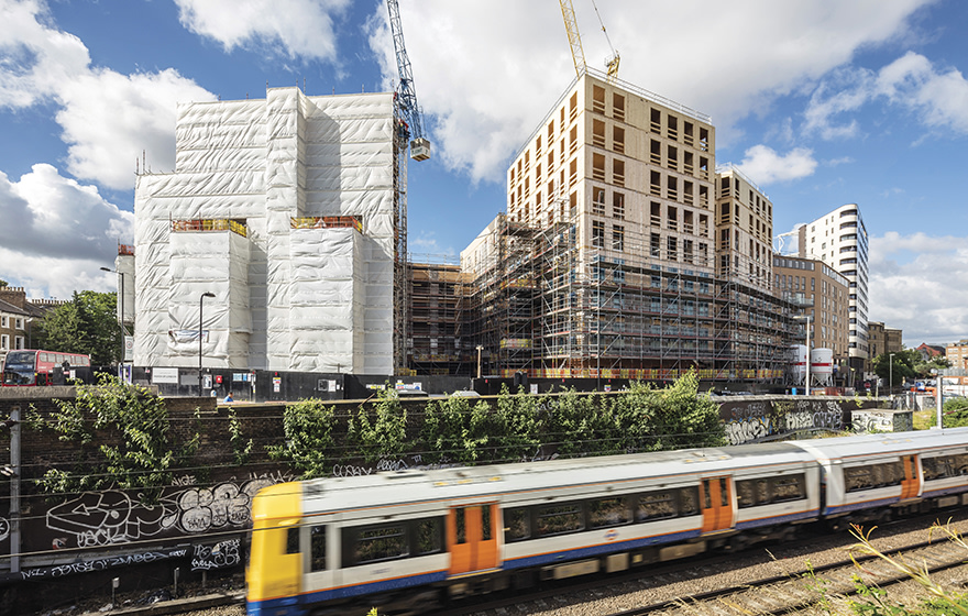 The lightness of CLT allowed Dalston Works to be built over Crossrail The lightness of CLT allowed Dalston Works to be built over Crossrail