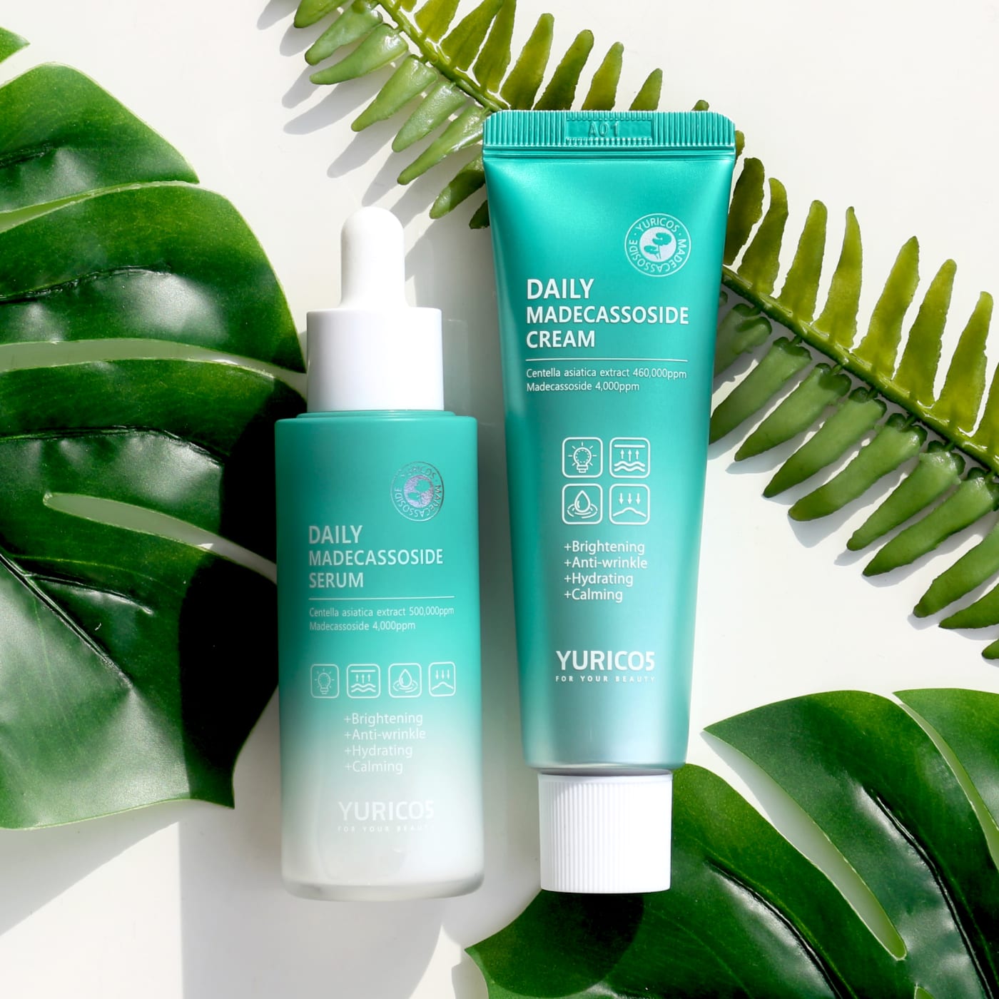 A fresh and refined product shot of YURICO5 Daily Madecassoside Serum and Cream