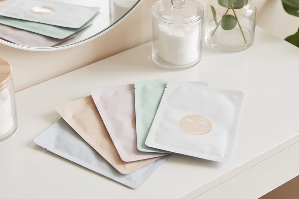 Mask pack products in various colors arranged neatly