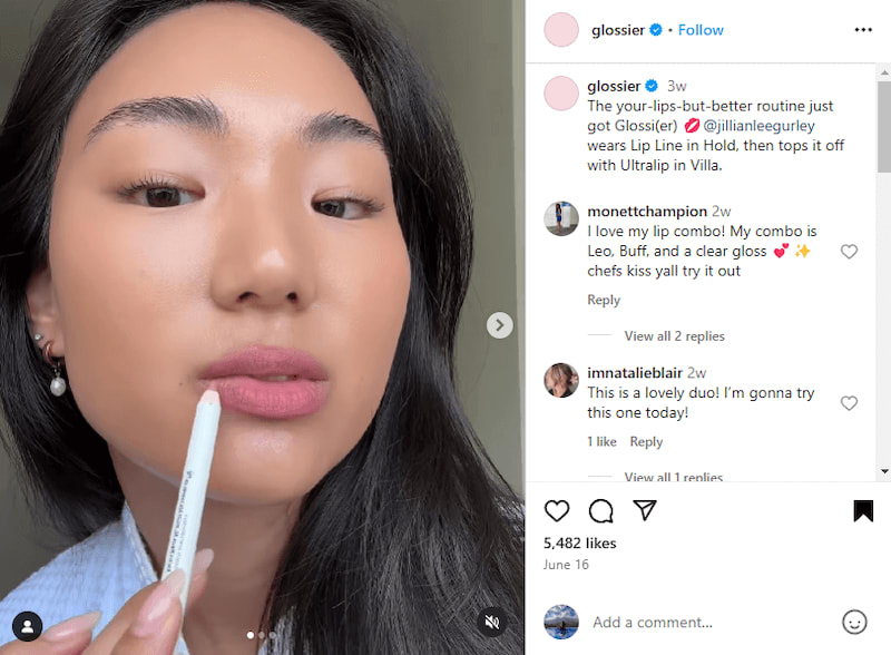 Glossier Instagram post showing a girl applying a lip liner in her lips.