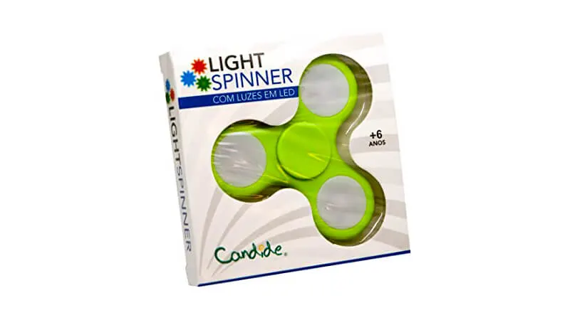 imagem de um fidget spinner da Candide na cor verde dentro da caixa