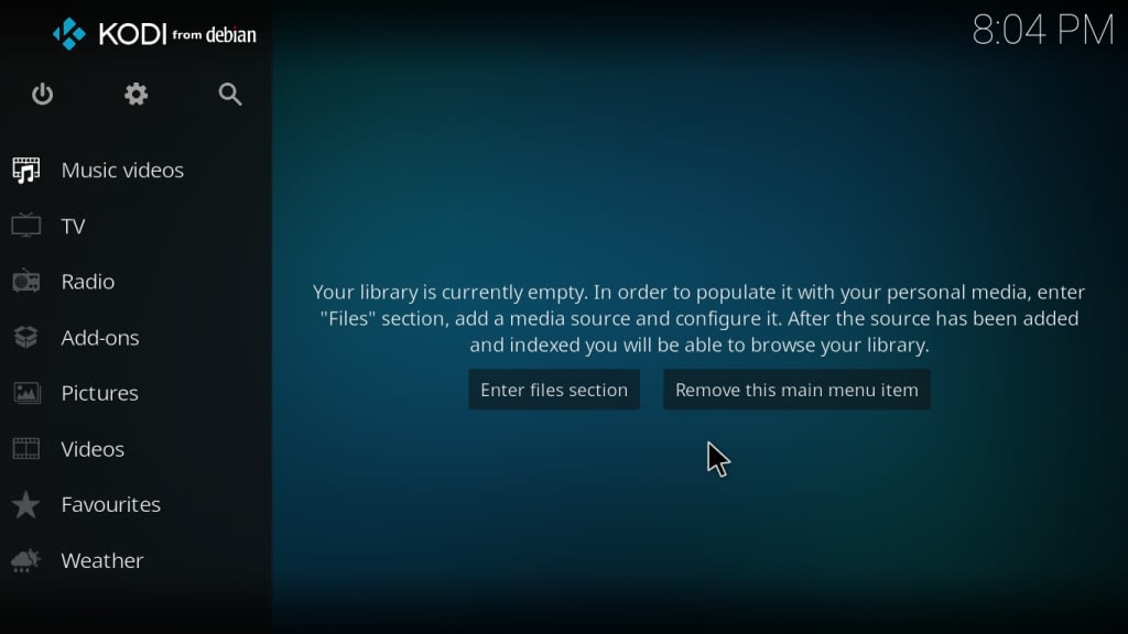 Il menu principale di Kodi con la skin predefinita Estuary: le voci Add-ons, Immagini, Video, Preferiti e Meteo nella colonna di sinistra e l'avviso che la libreria è vuota.