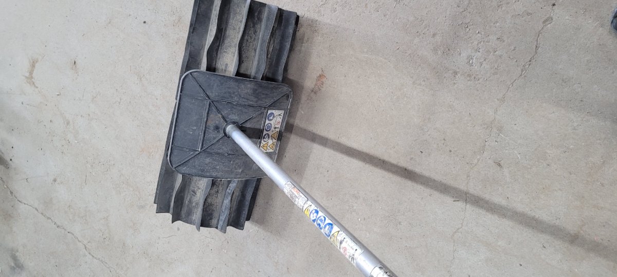 Sweeper attachment for trimmer base — photo 1