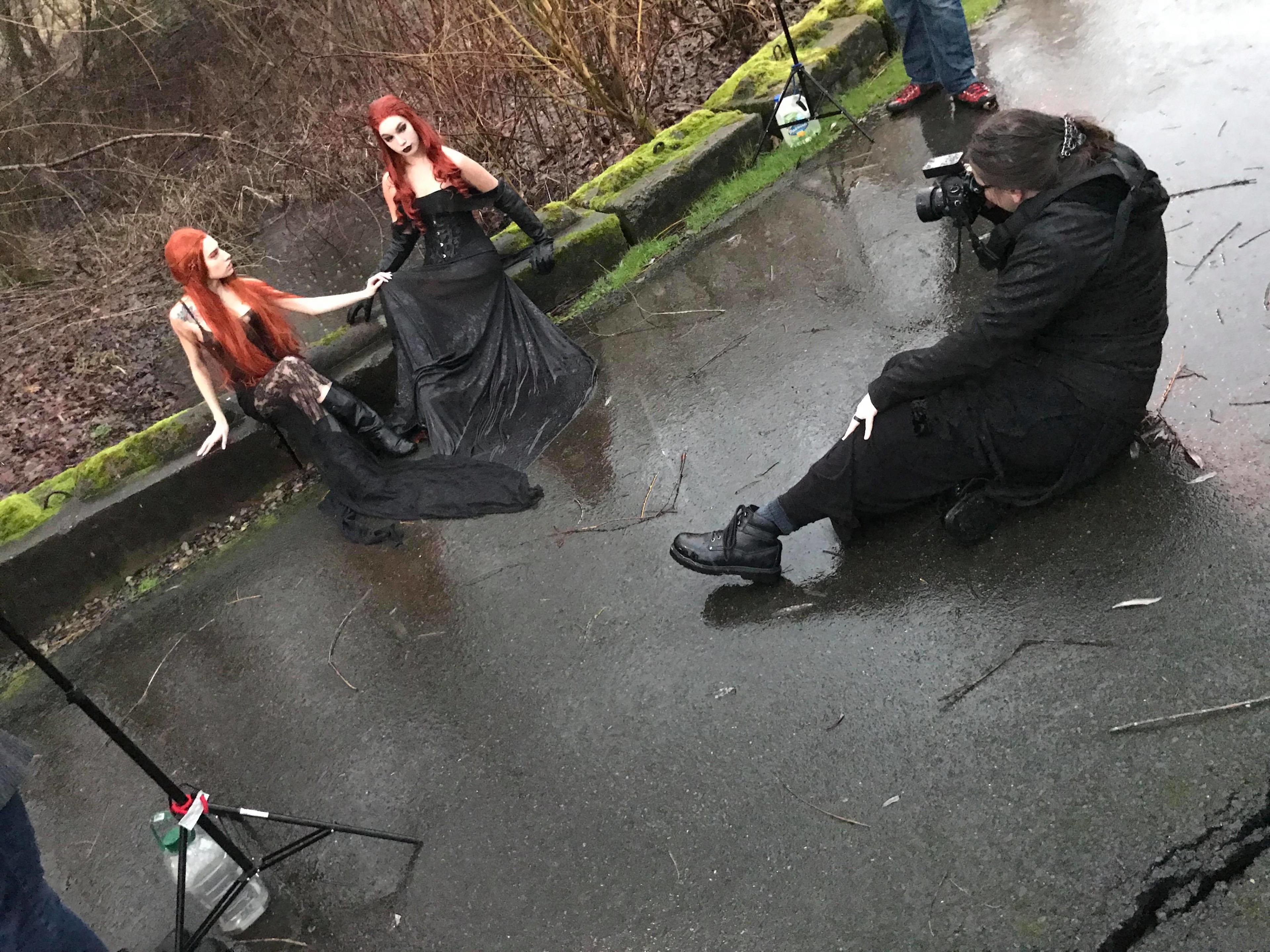 Alaina shooting a gothic editorial in the rain