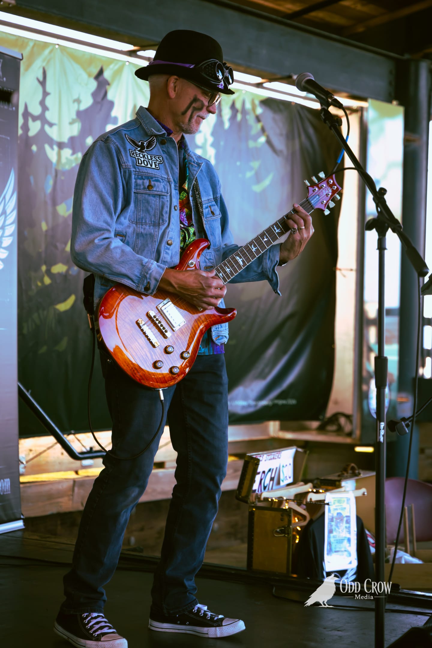 The same guitarist locked in on the fretboard during Reckless Dove's bonus set