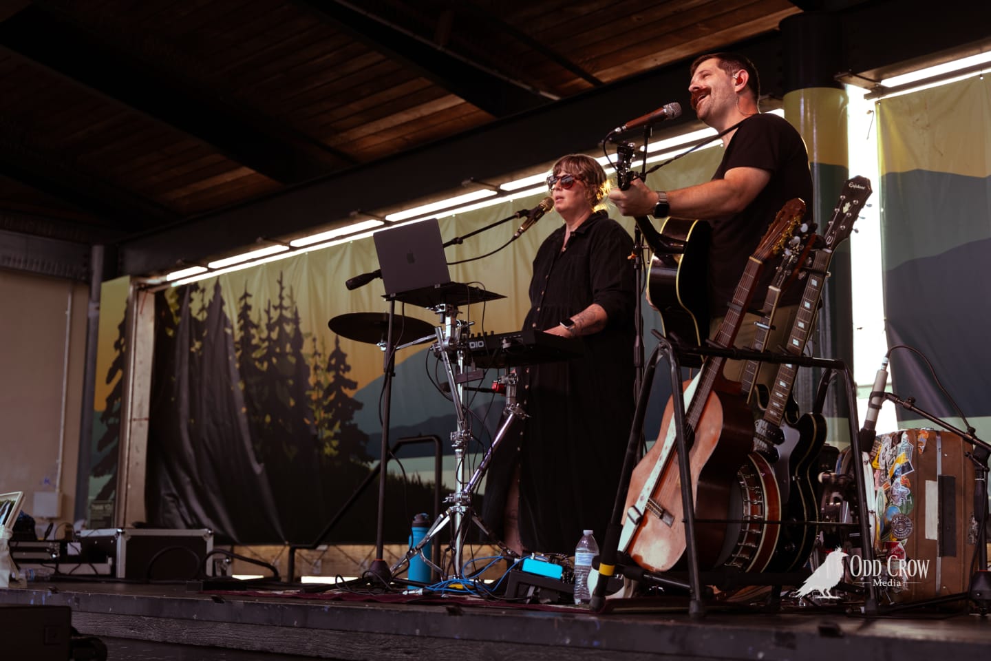 Hazy, smoke-tinted sun behind the stage during National Park Radio's set