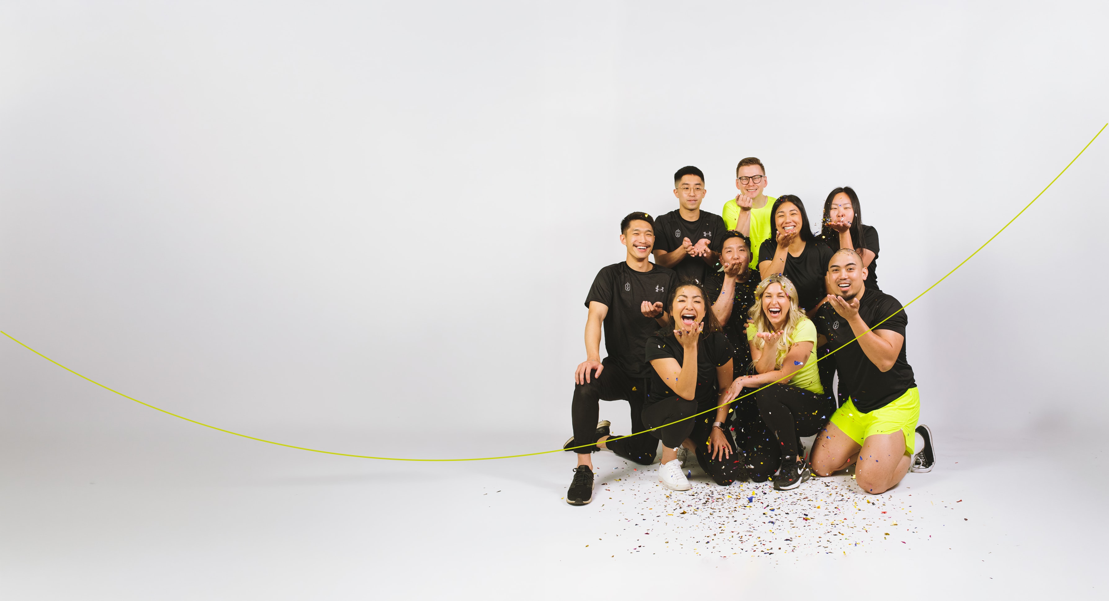 Therapy X team smiling together during a happy moment.