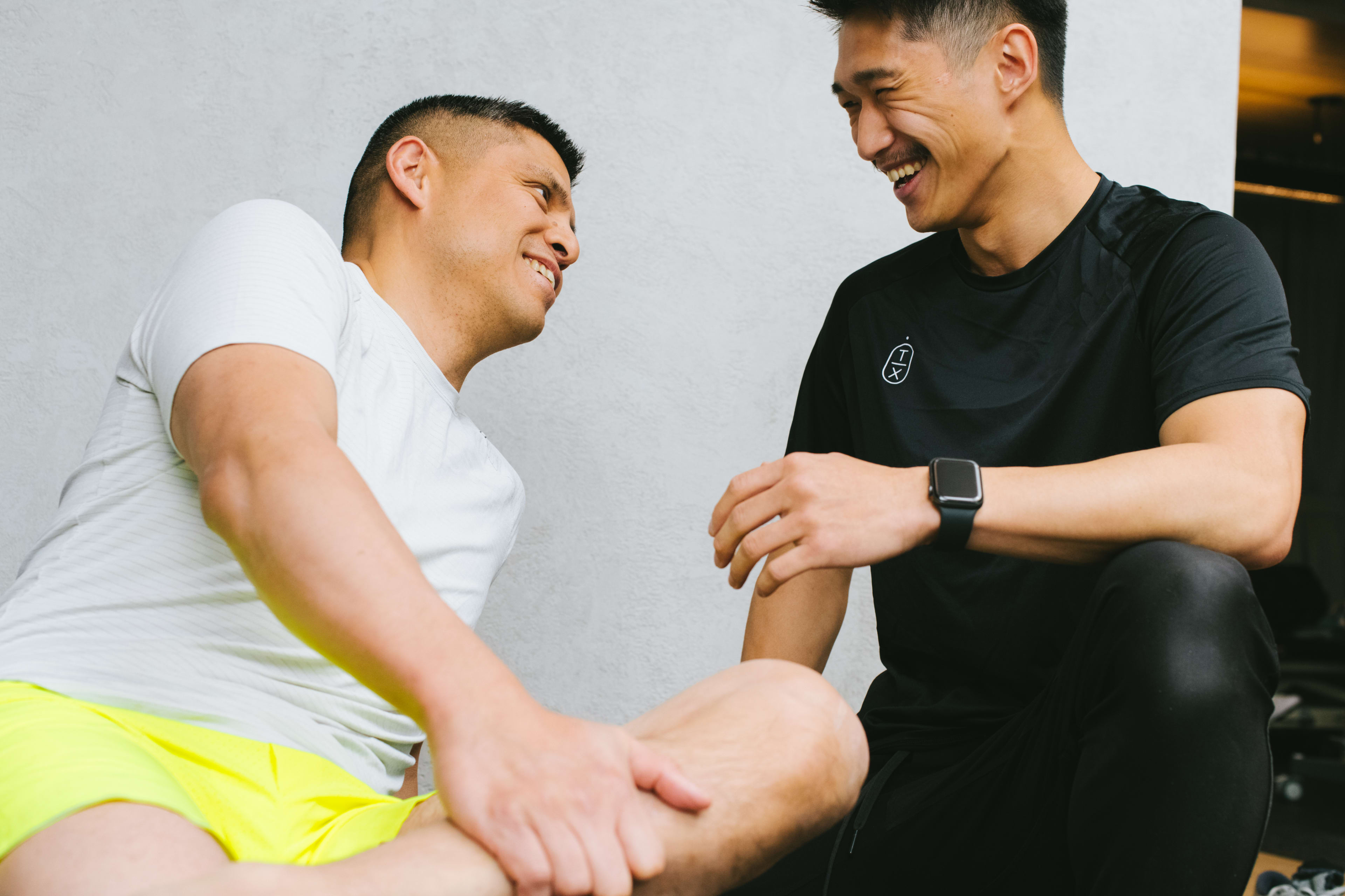 Practitioner smiling with patient.