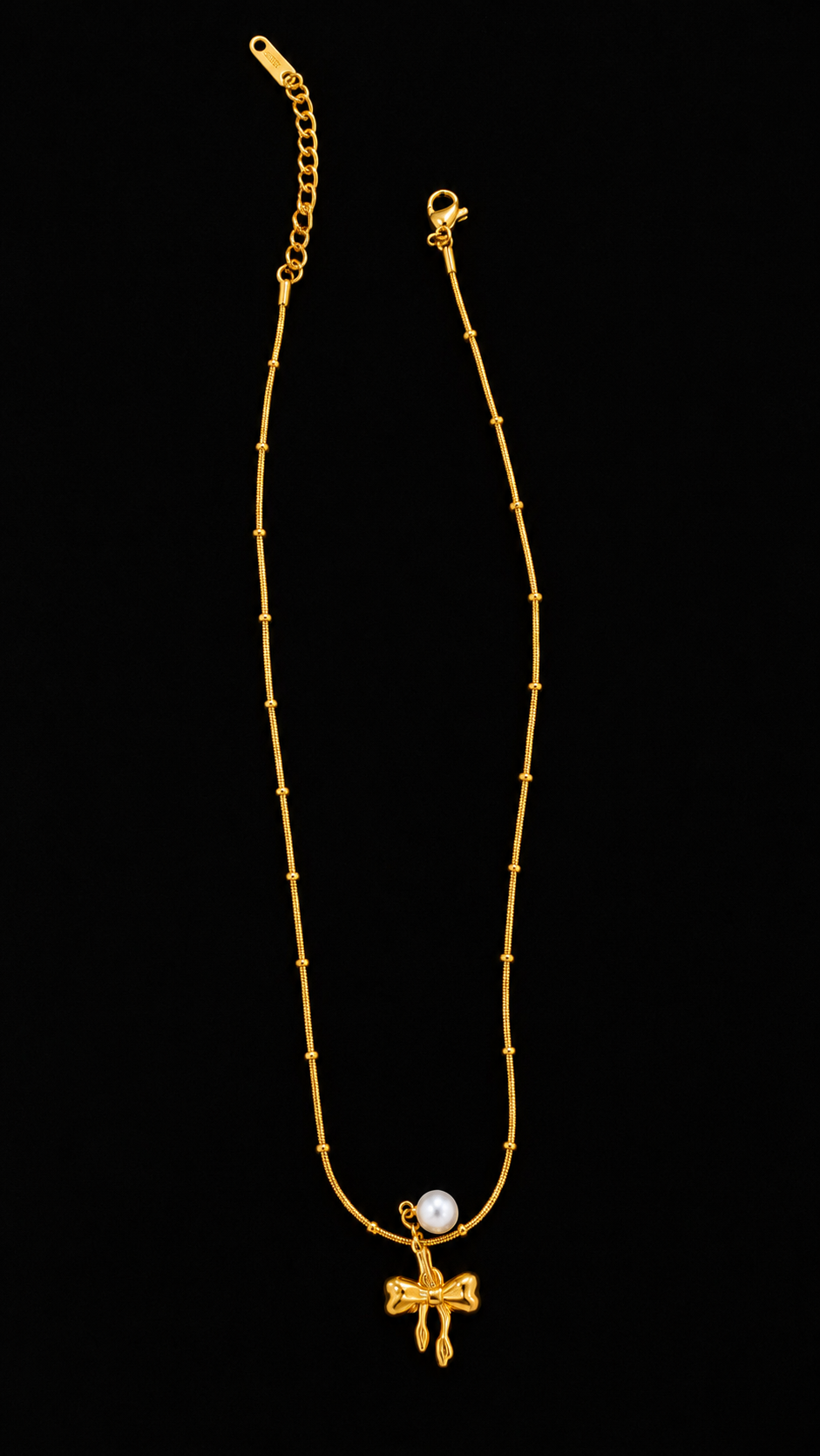 Pearl bow gold necklace