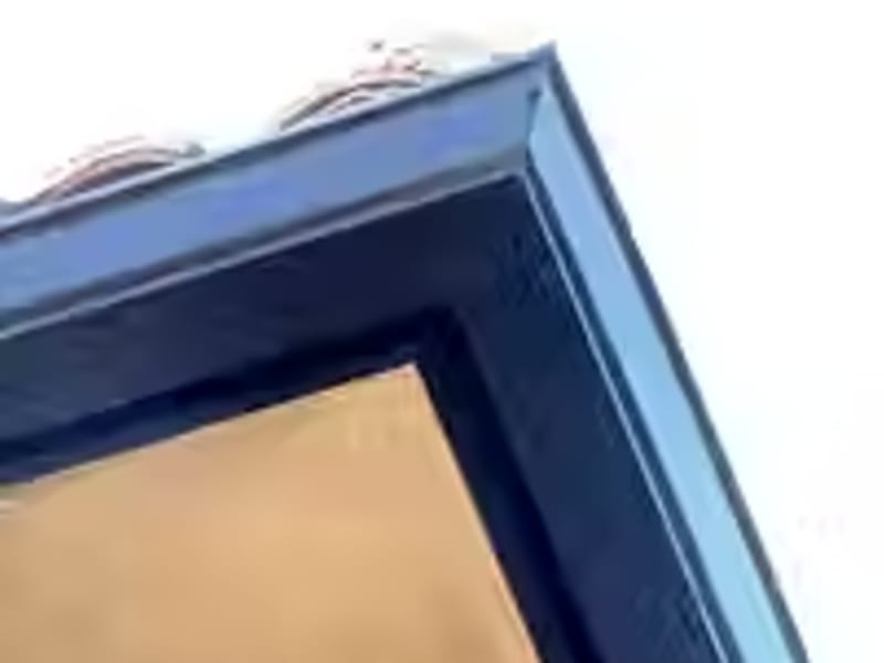 Custom-cut gutter corner detail showing seamless fit