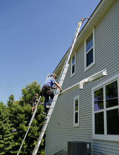 Seamless gutter installation by Arizona Seamless Gutters crew