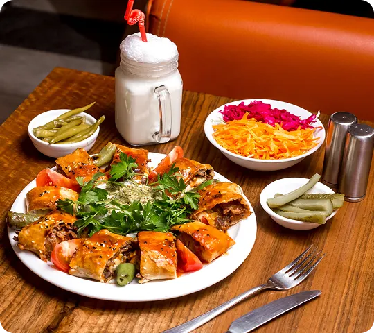 British Cuisine British cuisine dish featuring fish and chips with traditional accompaniments