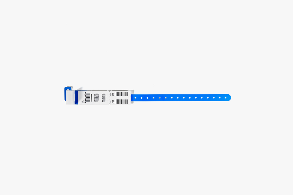 Blue Typenex Medical Barcode Plus Condensed hospital patient blood band (C4004) with plastic overlay and barcode symbology.