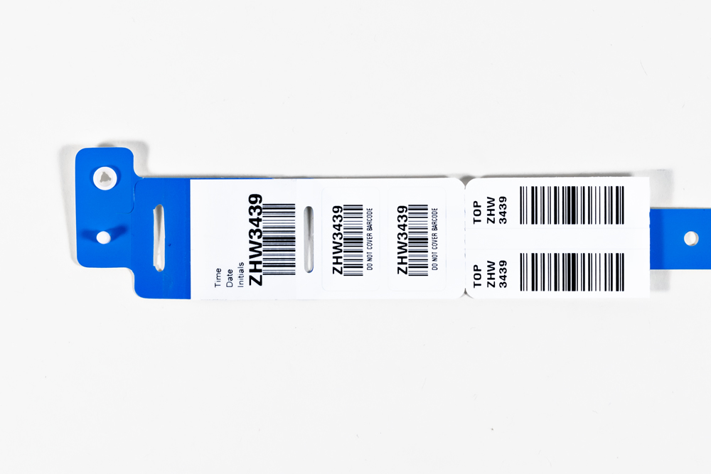 Blue Typenex Medical Barcode Plus Condensed hospital patient blood band (C4004) with unique BBID and barcode symbology GS1-128.