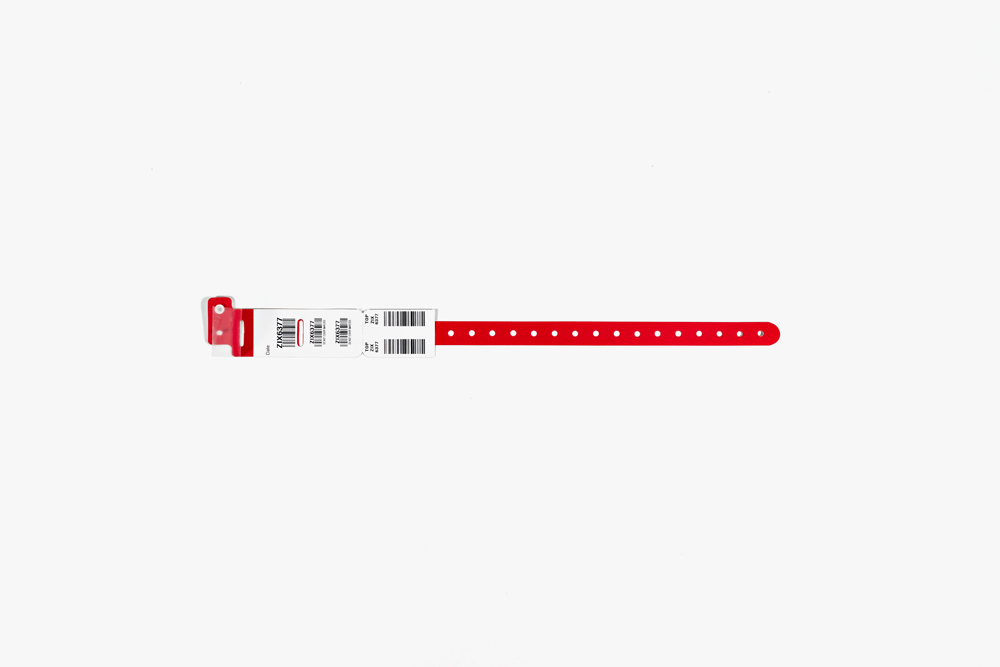 Red Typenex Medical Barcode Plus Condensed hospital patient blood band (C4001) with plastic overlay and barcode symbology.