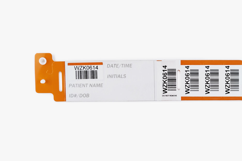 Orange Typenex Medical Barcode Plus Handwritten blood band (C4004) with unique BBID and barcode symbology GS1-128.