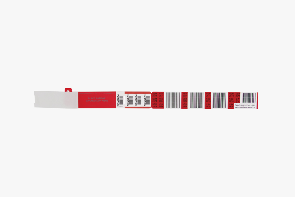 Red Typenex Medical Barcode Plus Label hospital patient blood band (4R5038) with plastic overlay and barcode symbology.