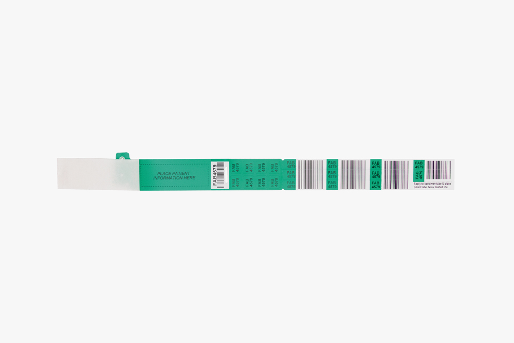 Green Typenex Medical Barcode Plus 8 Label blood band (4R4589) with plastic overlay and barcode symbology GS1-128.