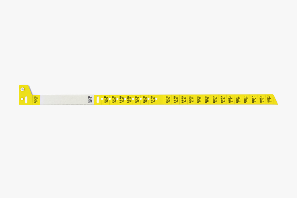 Yellow Typenex Medical non-barcoded Slim 3 blood band (AB0101Y) with handwritten patient data and unique BBID.