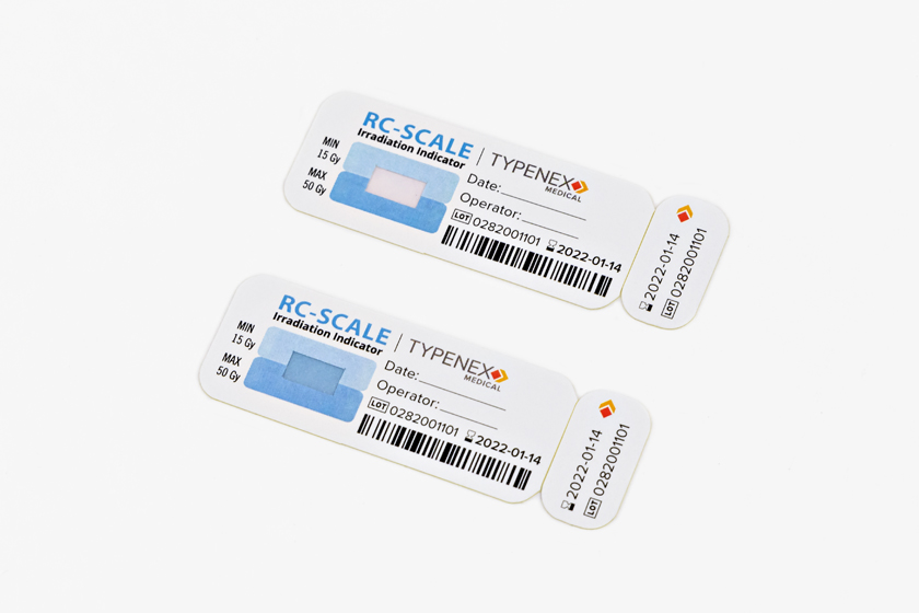 Typenex Medical Rad-Control Scale indicator tags. Top: Pre-irradiation. Bottom: Post-irradiation, verified.