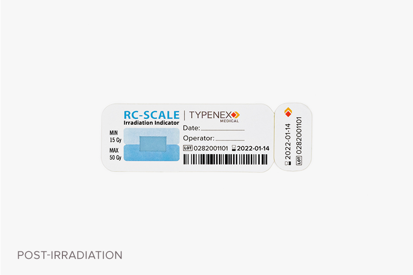 Typenex Medical Rad-Control Scale blue semi-quantitative indicator tag, prior to irradiation.