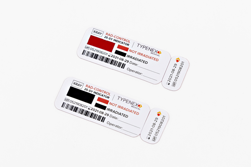 Typenex Medical Rad-Control Standard indicator tags. Top: Pre-irradiation. Bottom: Post-irradiation, verified.