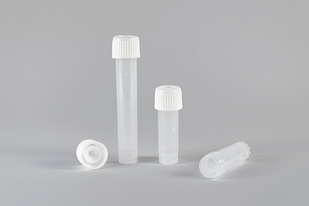 Typenex Medical 10 mL and 5 mL translucent specimen transport tubes with measurement line graduations and white caps.