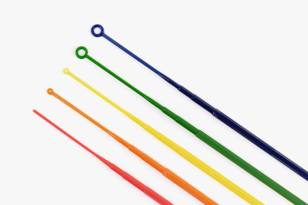 Red rigid inoculation needle, orange rigid inoculation loop, yellow flexible inoculation loop, green flexible inoculation loop, and dark blue rigid inoculation loop.