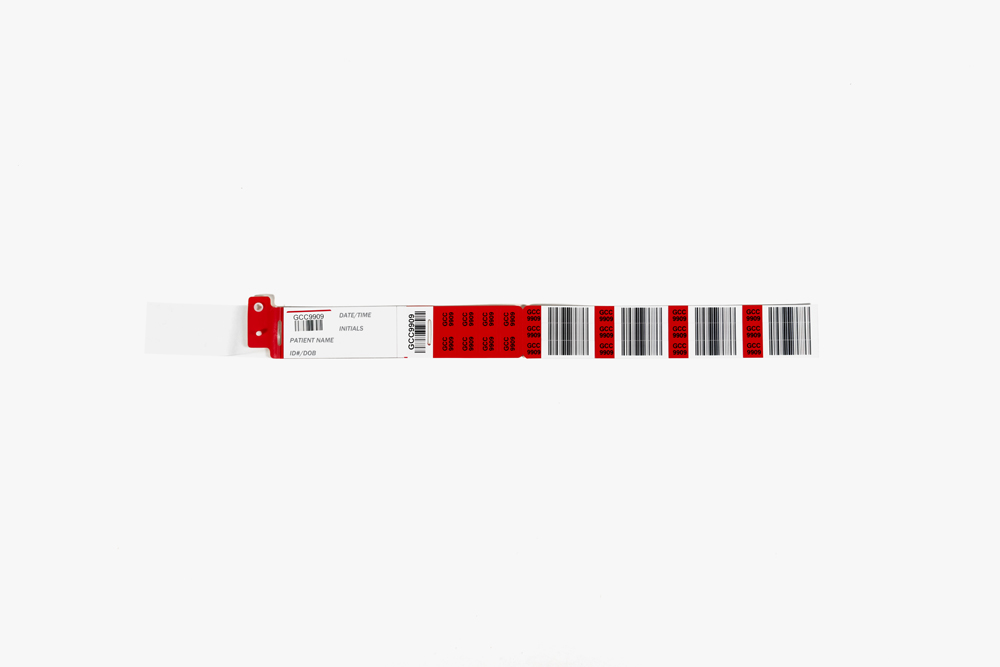 Red Typenex Medical Barcode Plus 8 Handwrittten blood band (4R4578) with plastic overlay and extra stickers.