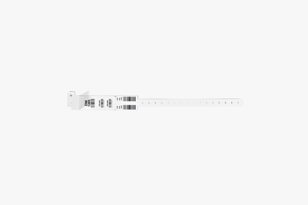 White Typenex Medical Barcode Plus Condensed hospital patient blood band (C4000) with plastic overlay and barcode symbology.