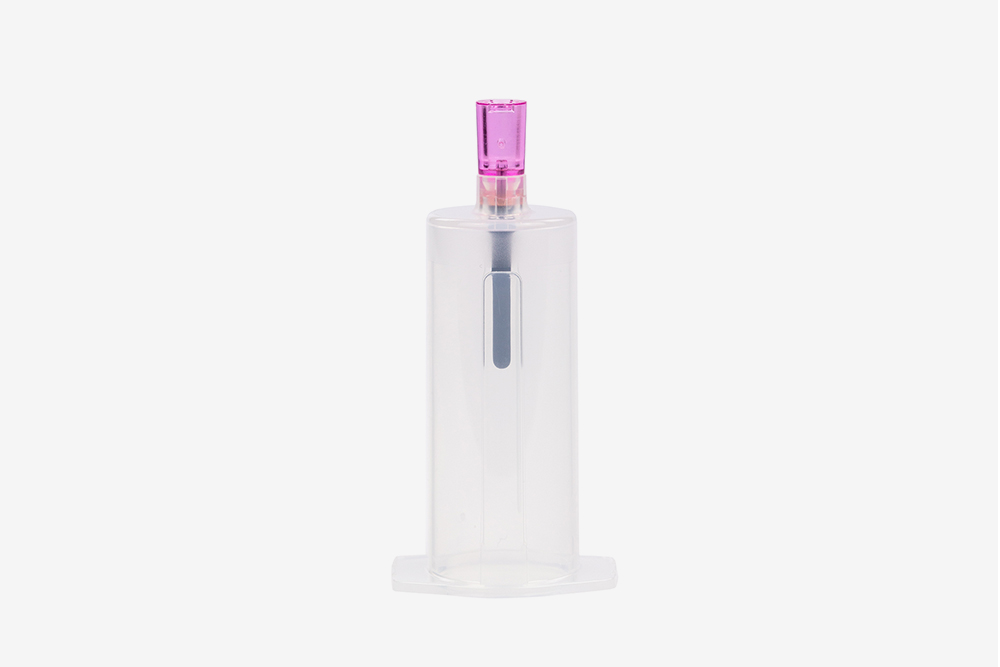 Blood transfer device with pink female luer lock.