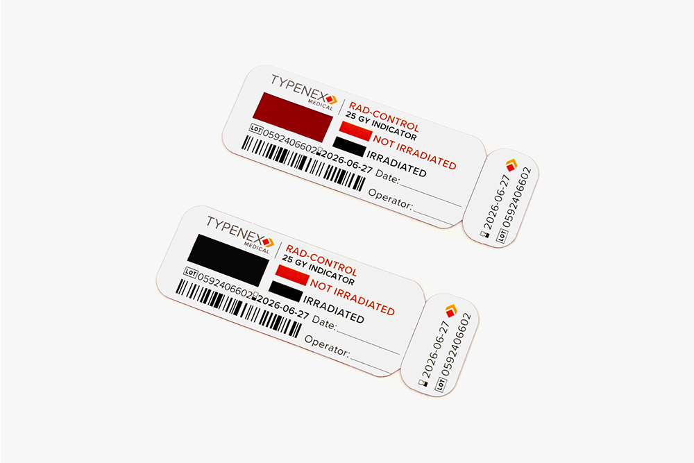Typenex Medical Rad-Control universal blood irradiation indicator tags. Top: Not irradiated, red. Bottom: Irradiated, black, verified.
