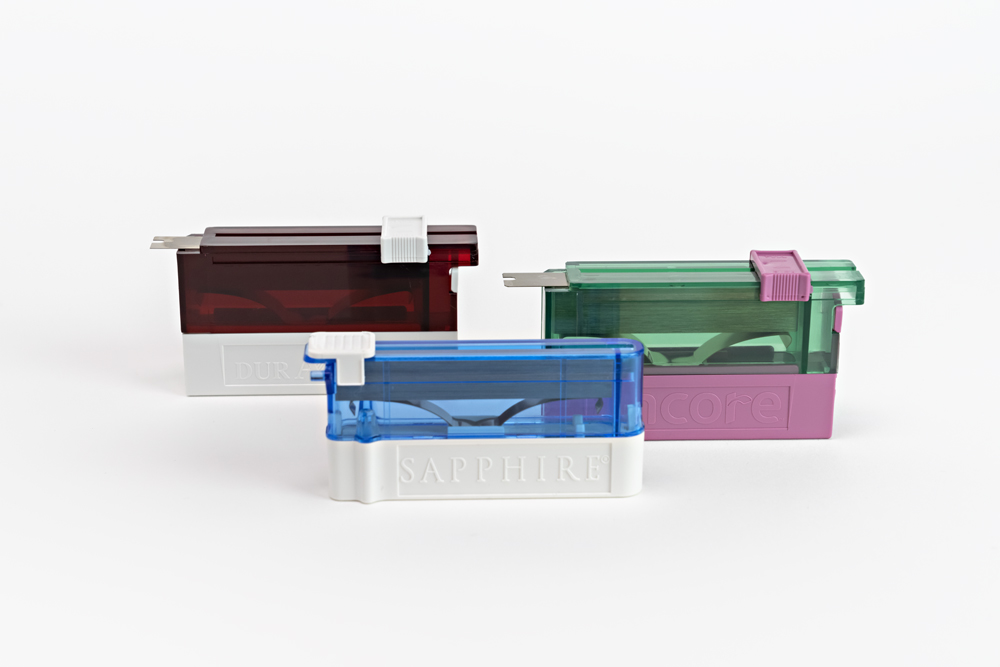 Disposable microtome blades in holders, from left to right: DuraEdge, Sapphire, Encore