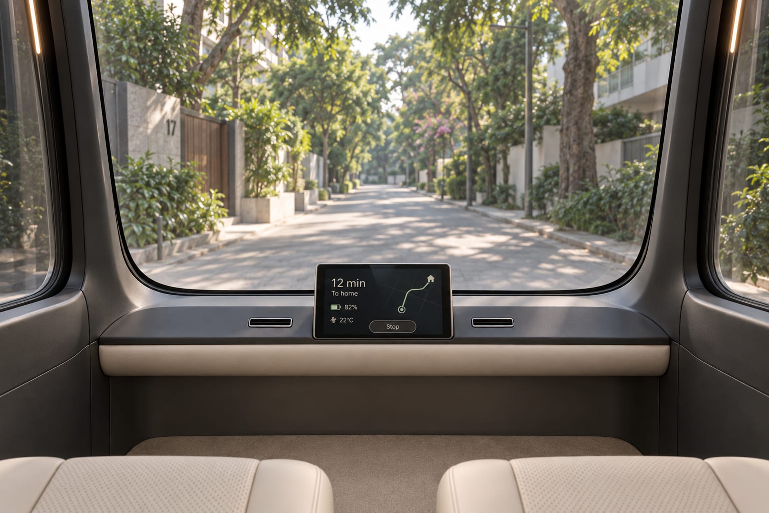Passenger view through Pod 1’s windshield with a small central touchscreen and clear knee space