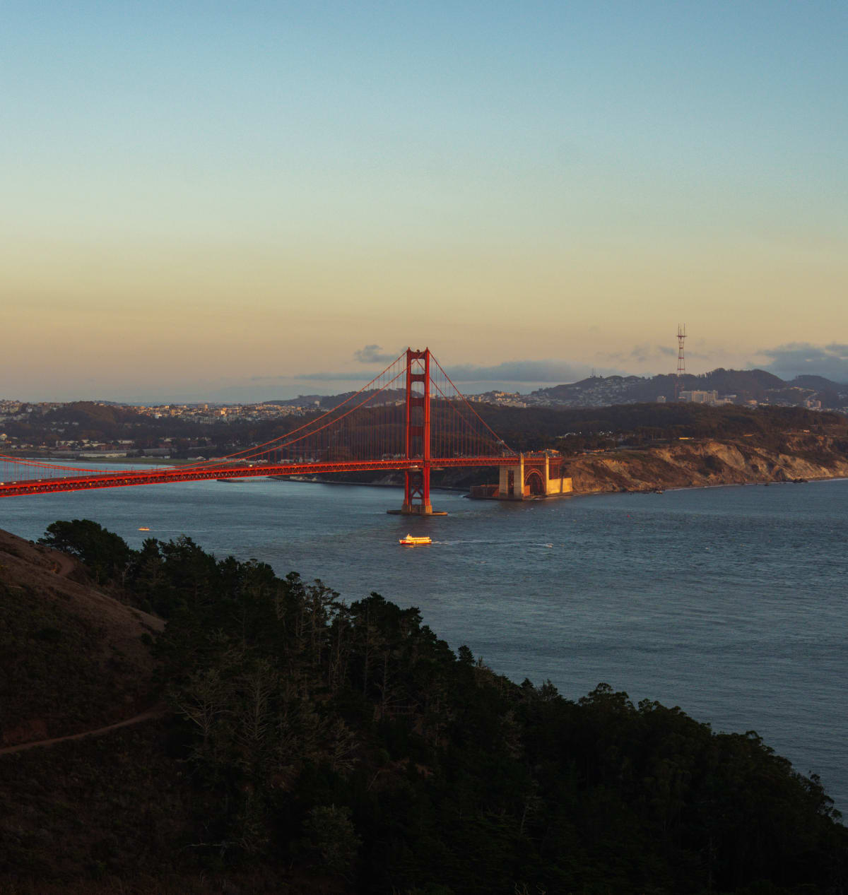 A Bright Red Bridge in the Distance