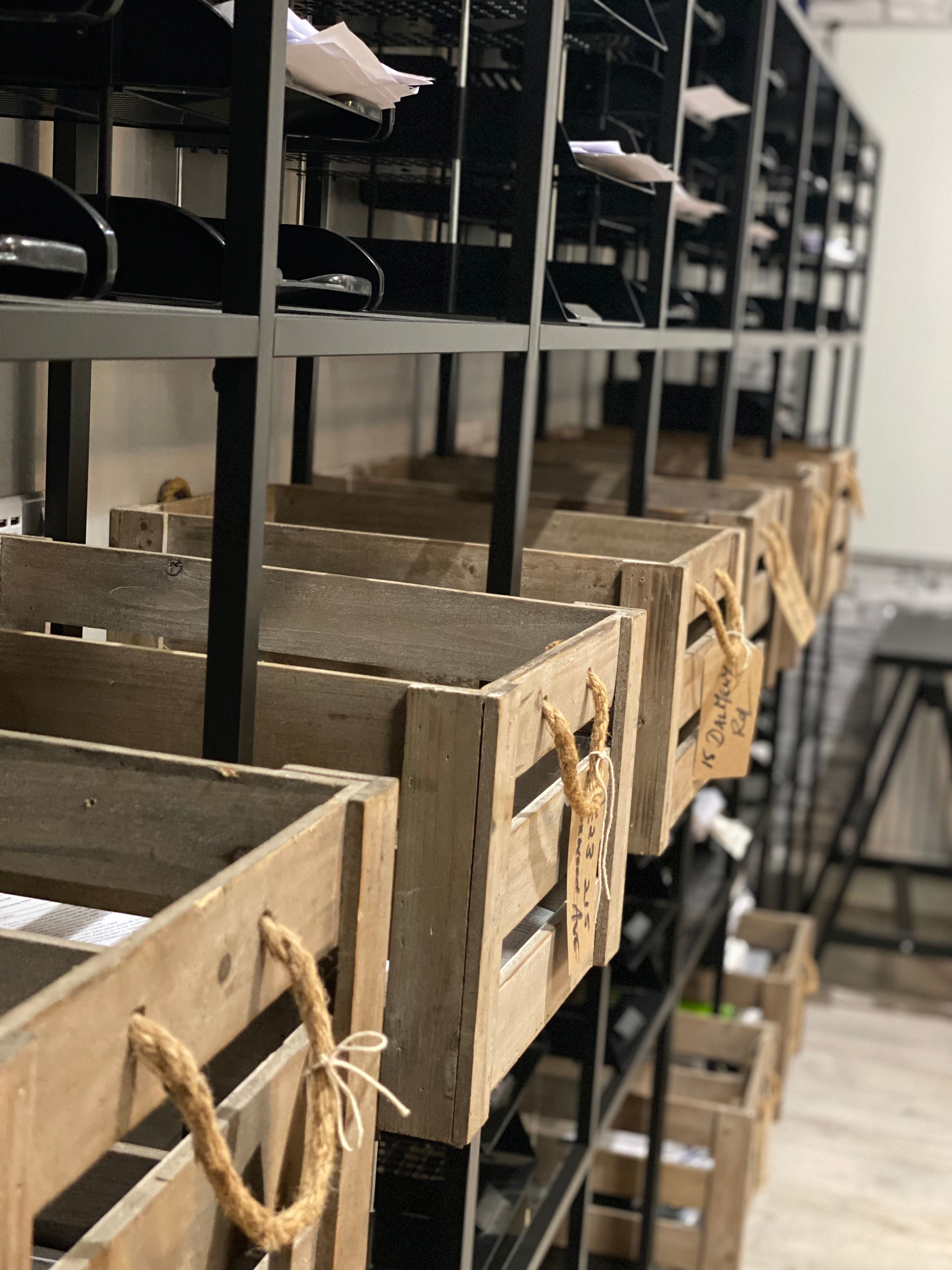 Boxes labeled with different construction project addresses