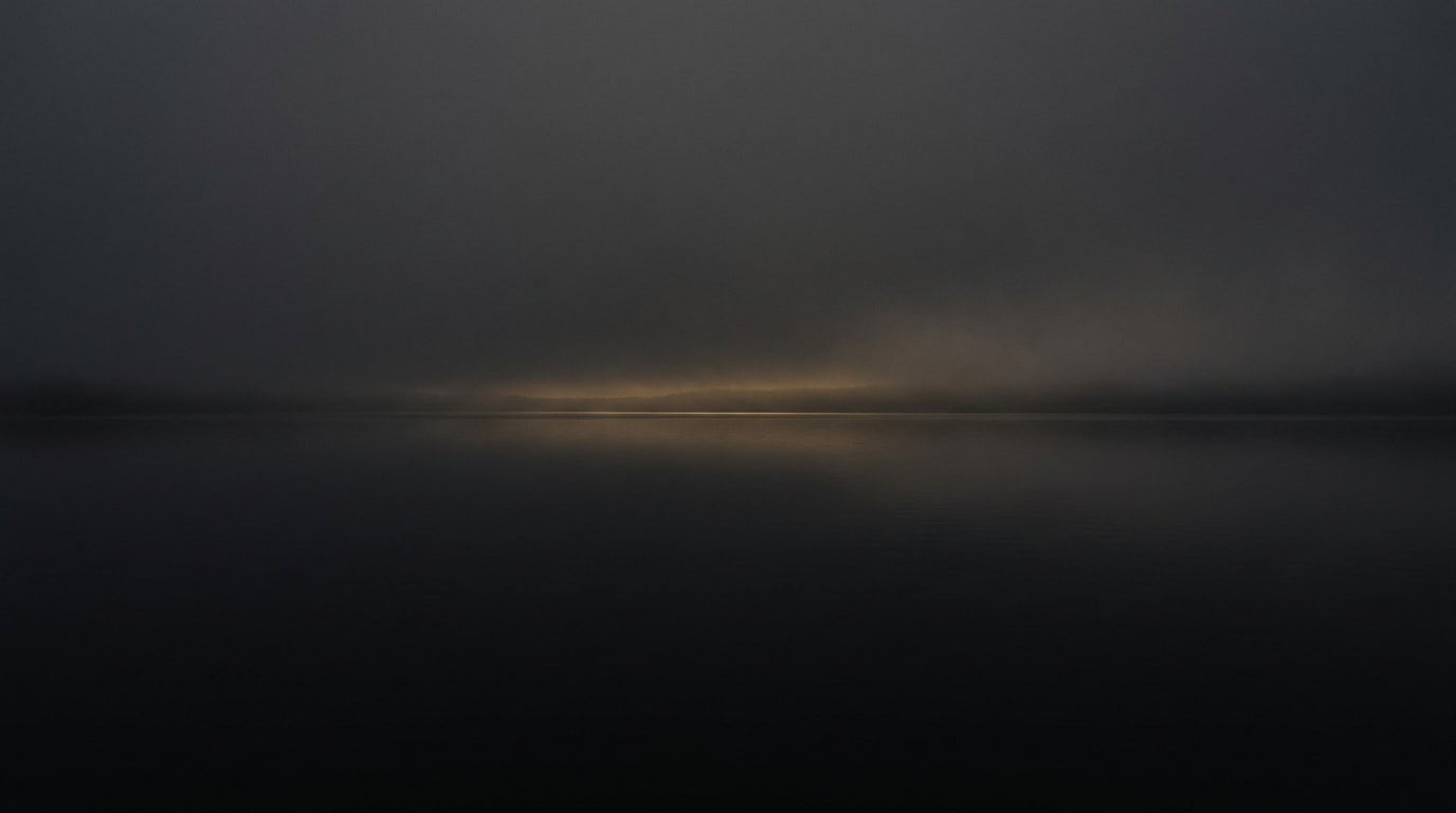 A still horizon under a wide, even light.