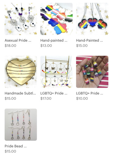 A screenshot of my listings in the LGBTQ+ Pride section of my shop. From left to right: Flower earrings and necklaces made with Asexual coloured beads and playing card charms. Flower keychains painted with 8 different pride flags. 3 heart shaped necklaces with the outline of each painted in the Asexual flag, and the inside of each heart painted in the Pan, Bi and Gay flags respectively. A small heart shaped dish that holds 5 silver bracelets that have beads each representing a different pride flag. 8 different circular earrings that have a butterfly dangling into the center of the circle, each earring has beads that represent a different pride flag. A handful of small bottles that are filled with layers of glitter representing different pride flags. 8 beaded earrings that represent 8 different pride flags, each with either a star, flower or circle charm on the end.