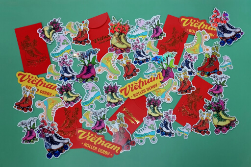 An assortment of roller skate themed stickers and red envelopes
