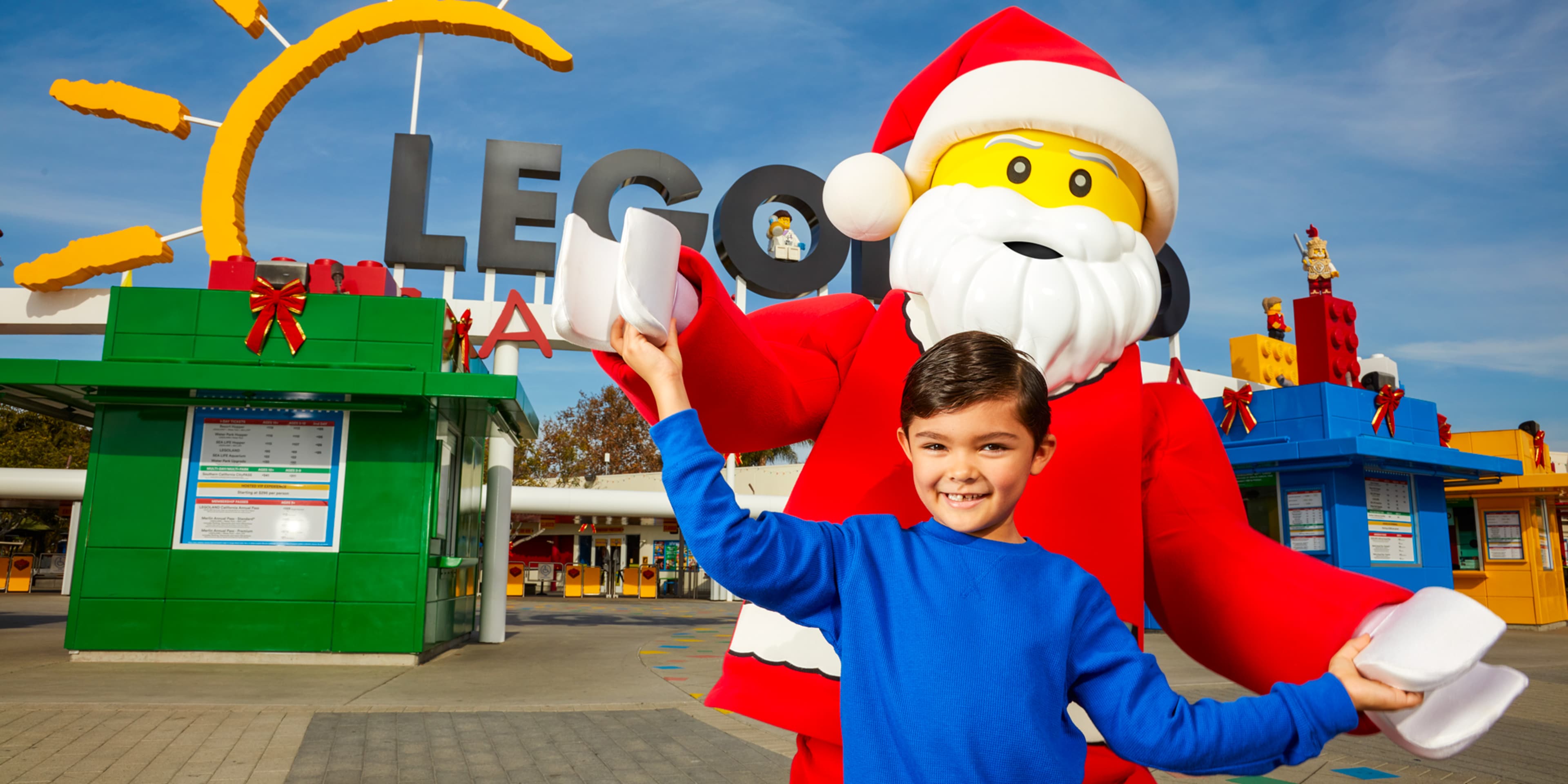 Child and LEGO Santa at the LEGOLAND® Gates