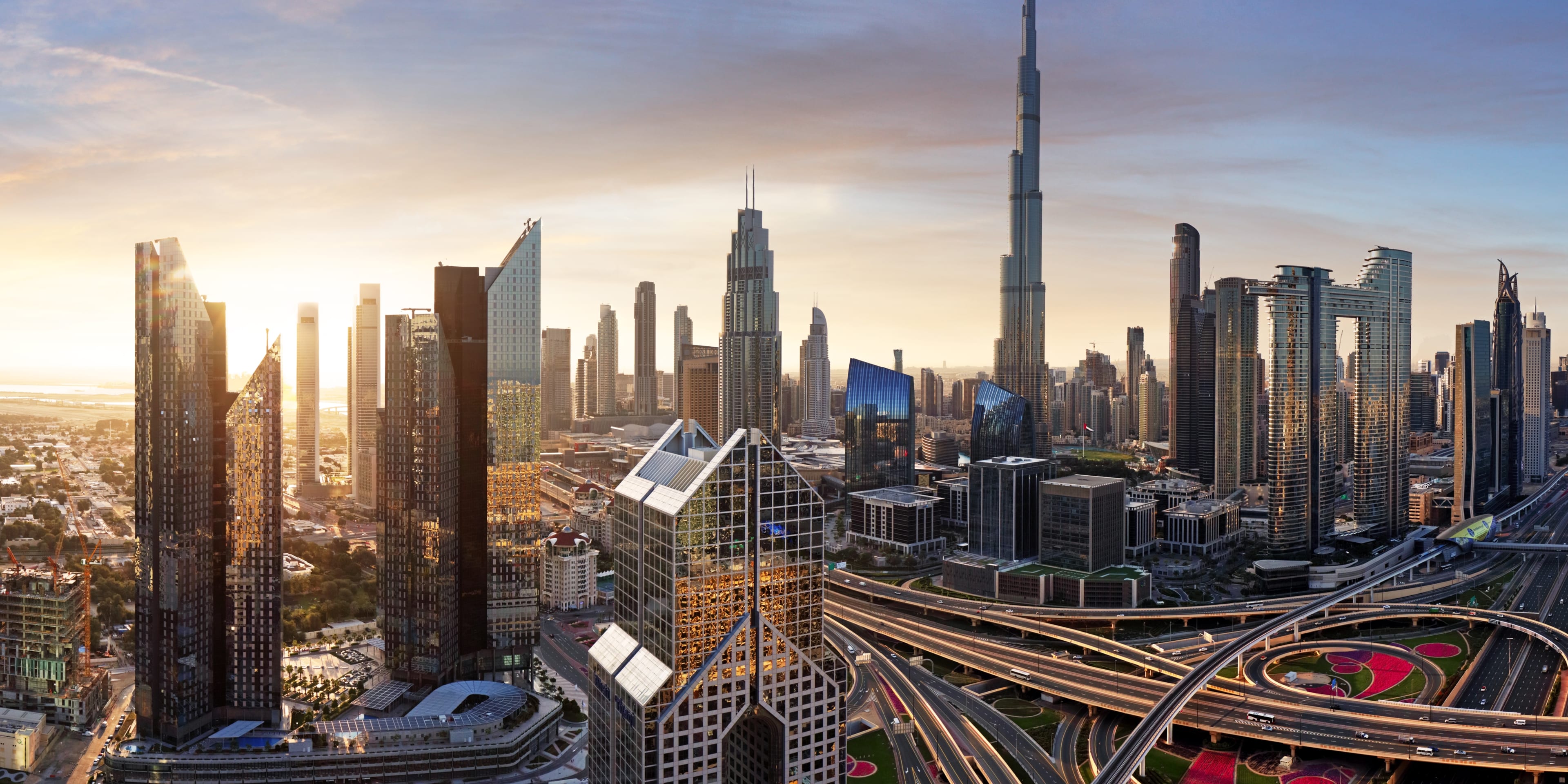 dubai-skyline-sunset-traffic-aerial-view