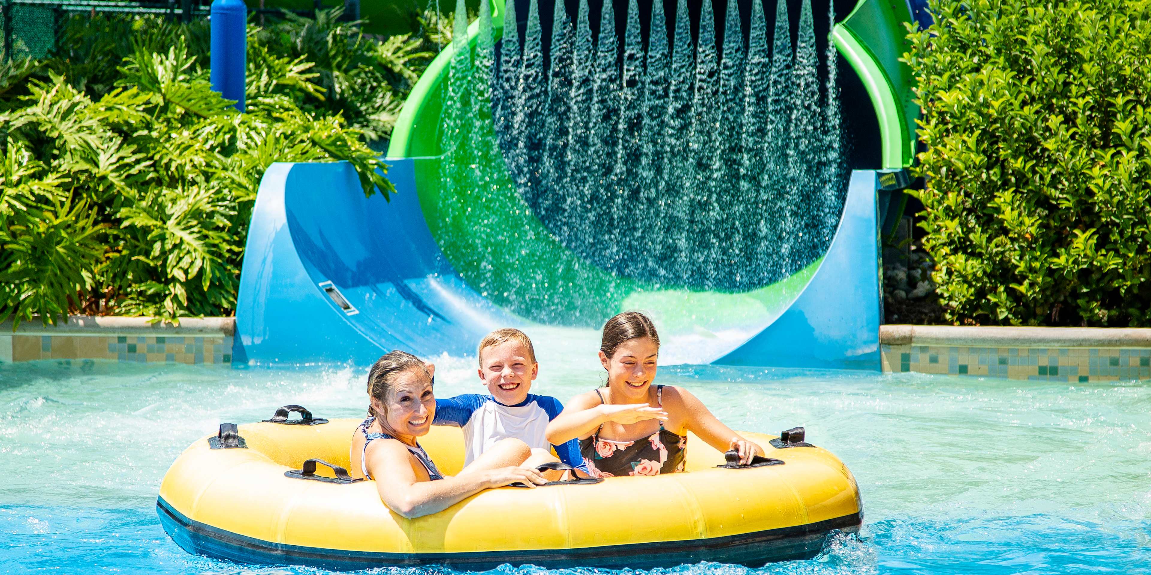 family enjoying a ride in a waterpark