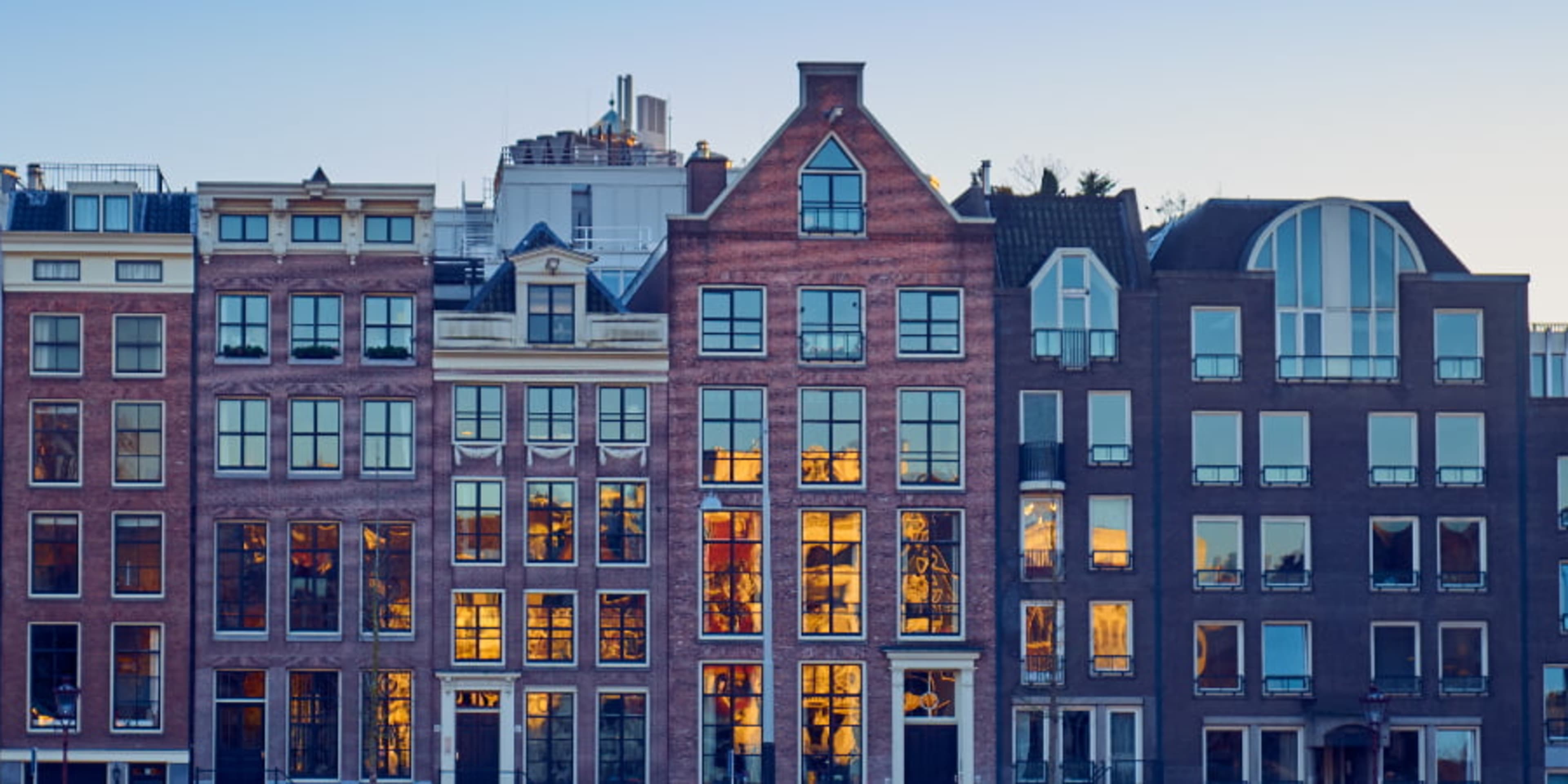 Line of iconic Amsterdam canal houses