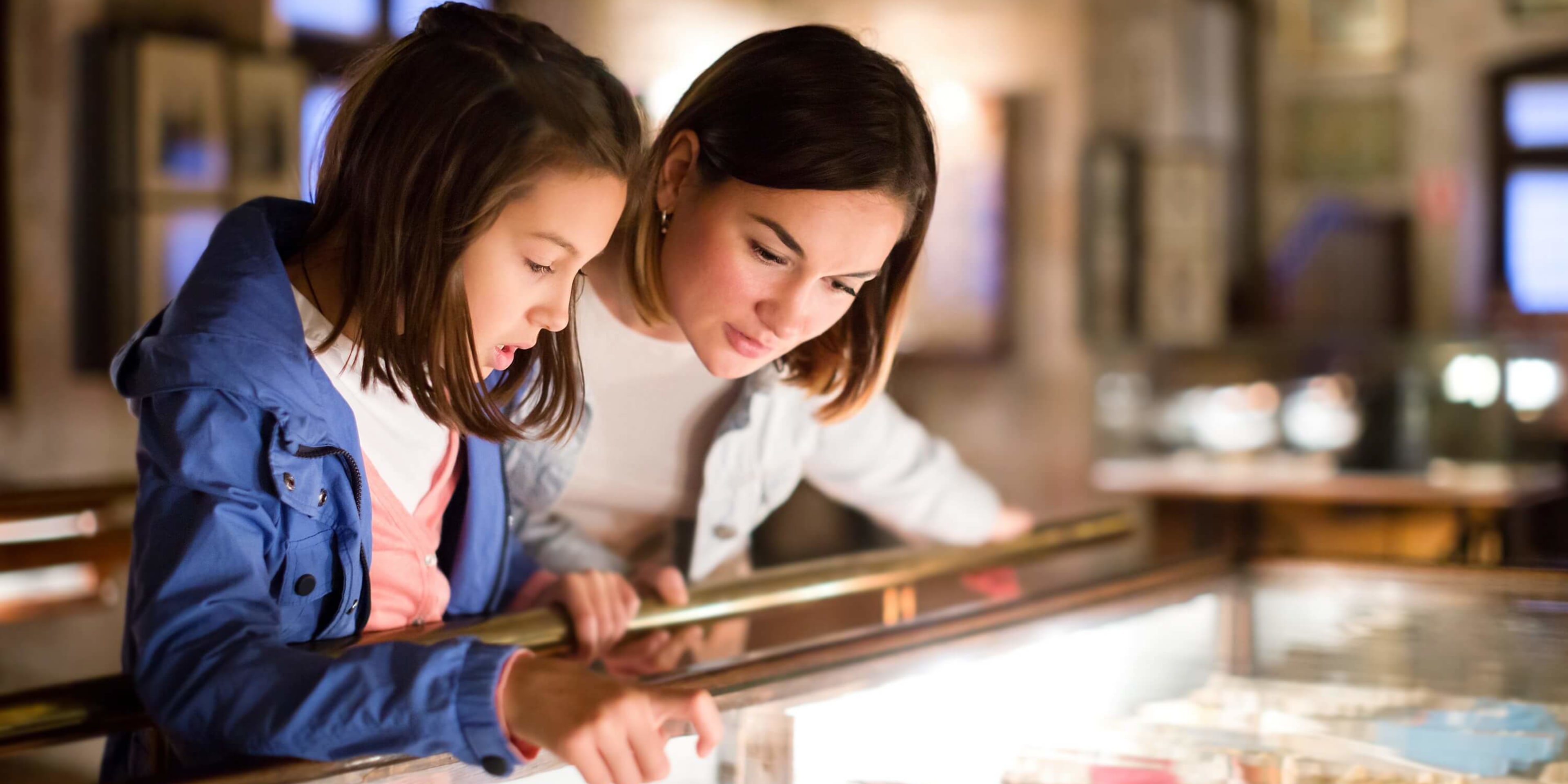 A mother and child check out a Chicago museum exhibit