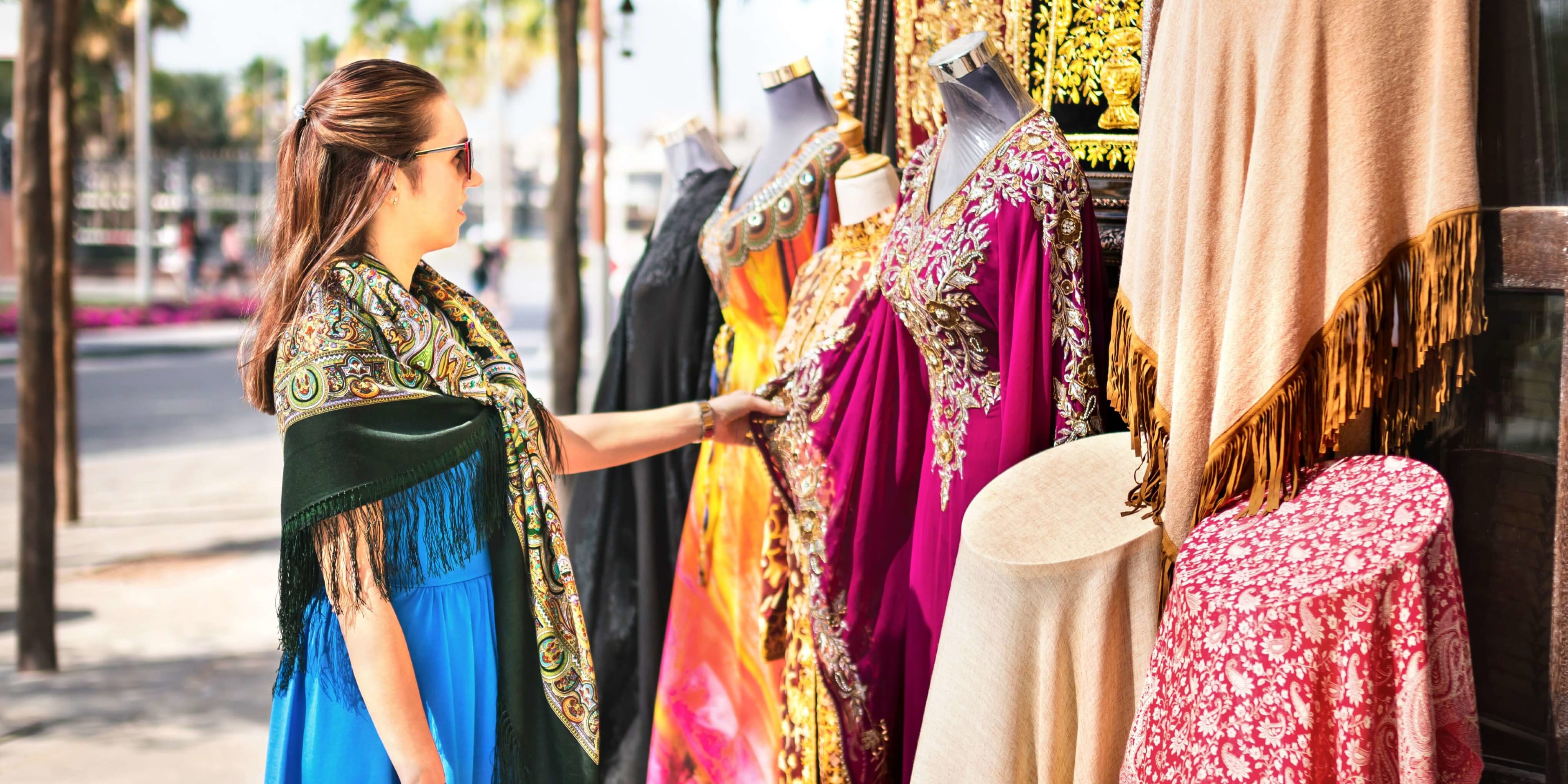 A woman shopping for clothes at a pop up market in Dubai