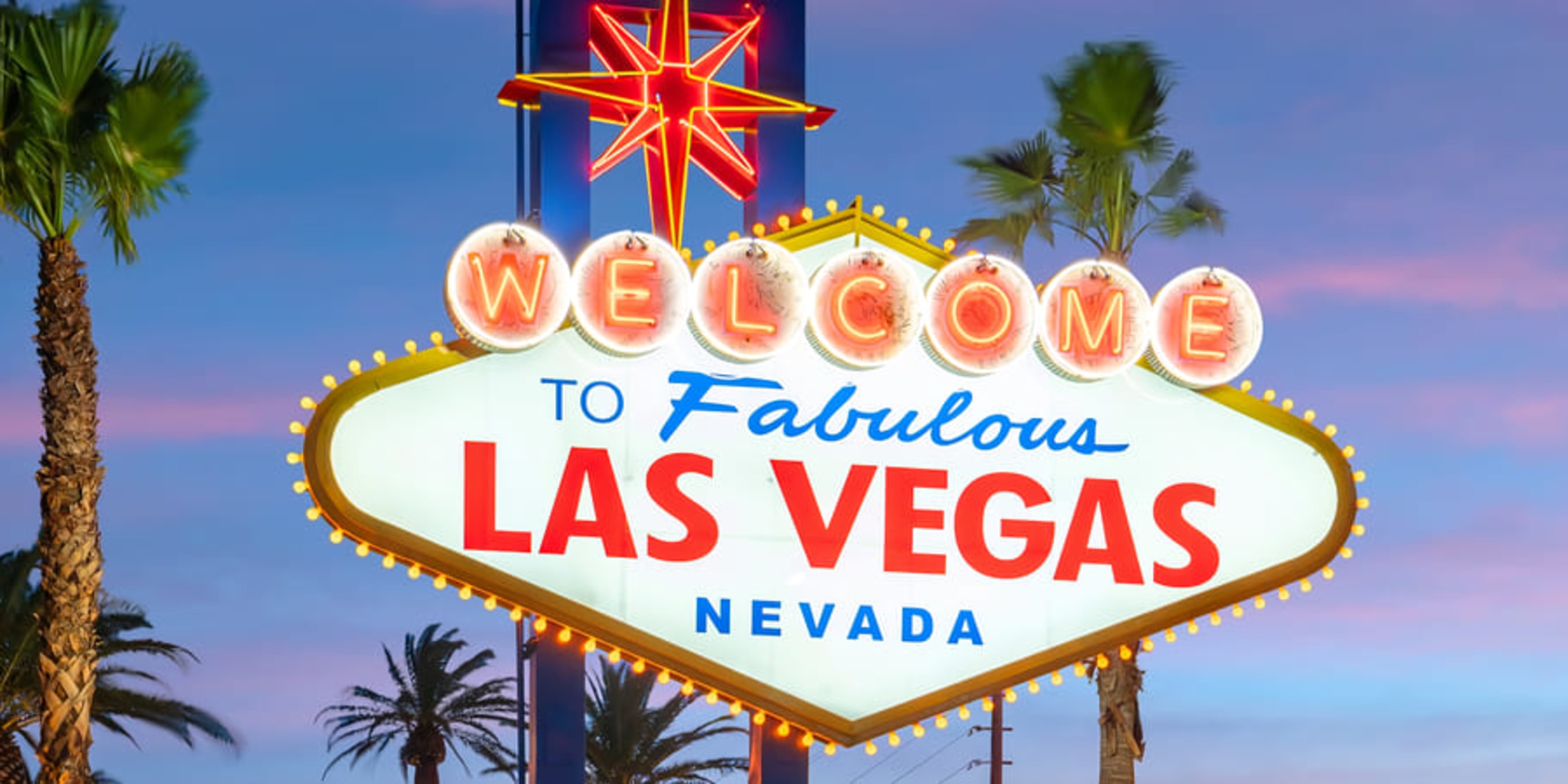 Cartel de Las Vegas al atardecer. Qué hacer en Las Vegas por la noche.
